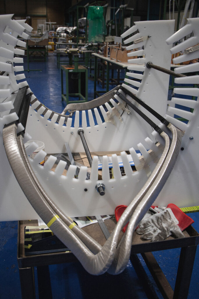 Coils being fitted into the stator
